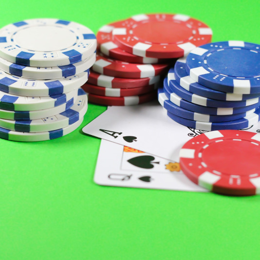 Live blackjack game with cards and chips at Evolution Singapore
