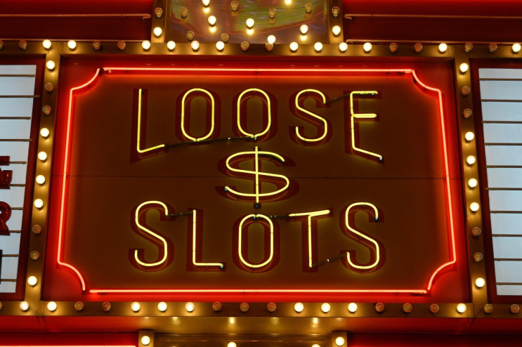 Live casino game show with bright lights and money wheel